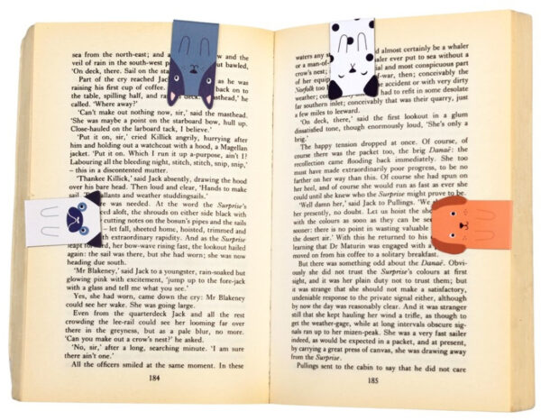 Magnetic Dog Bookmarks on a book